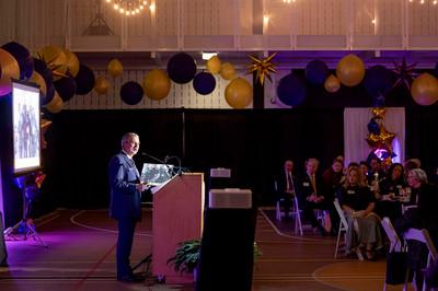 Mark Zupan at a podium speaking